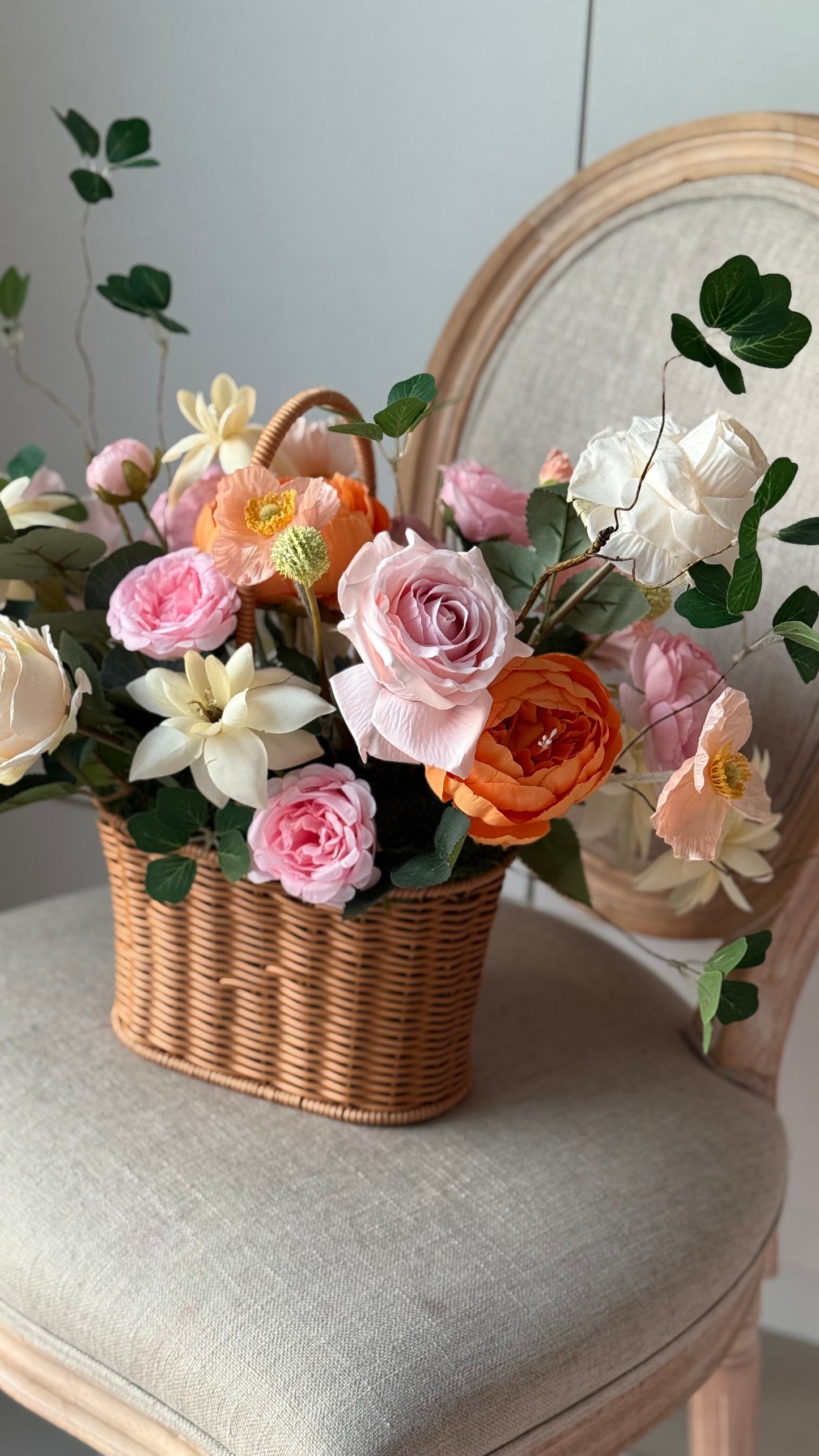 Large basket with handle flower arrangement