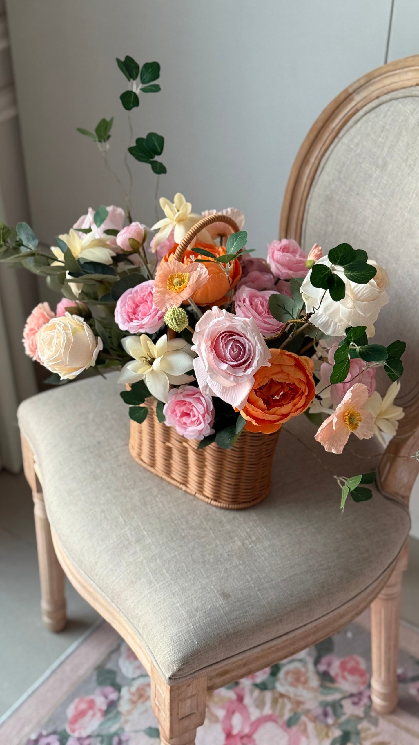 Large basket with handle flower arrangement