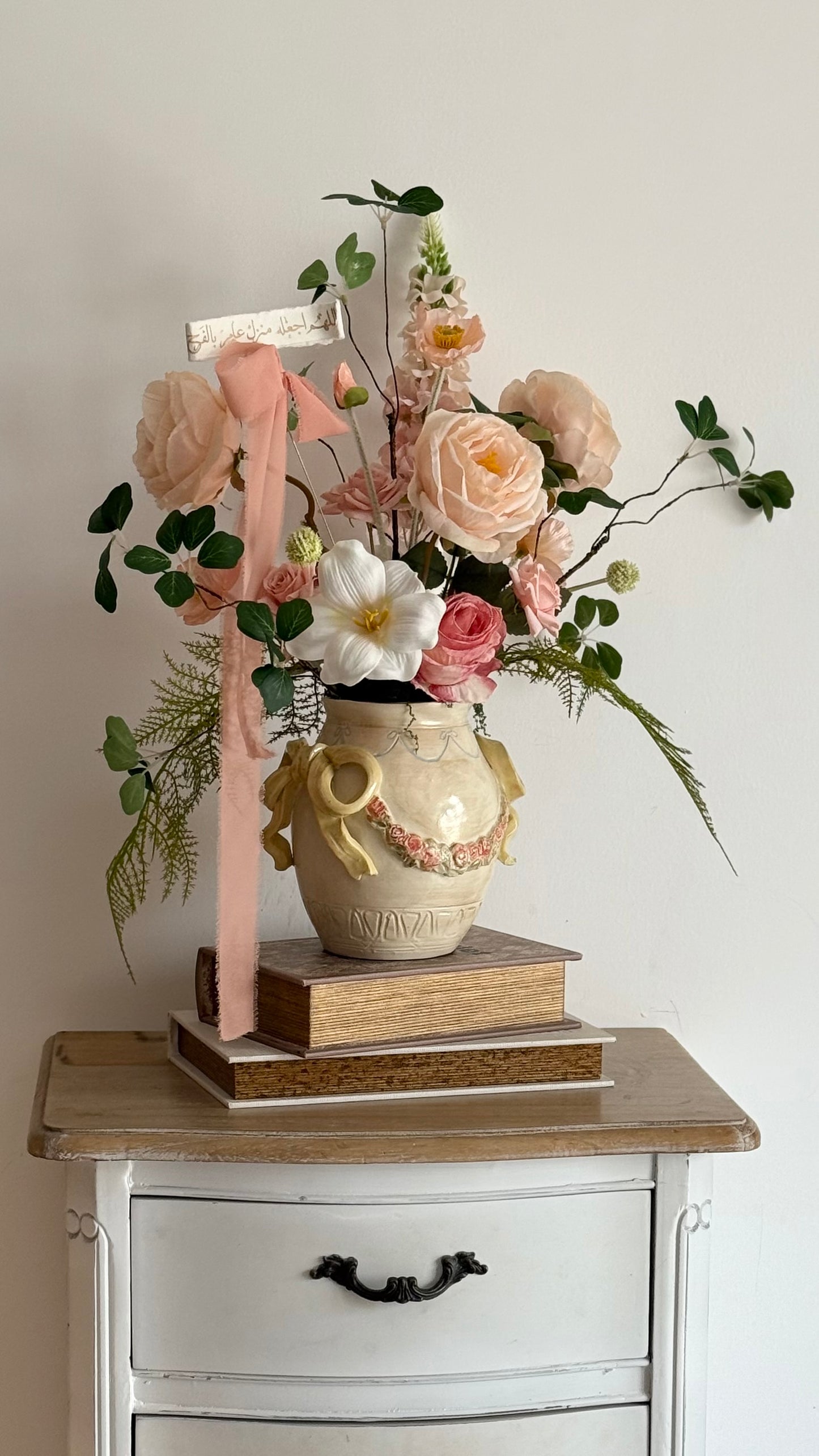 Ceramic bow details flower arrangement
