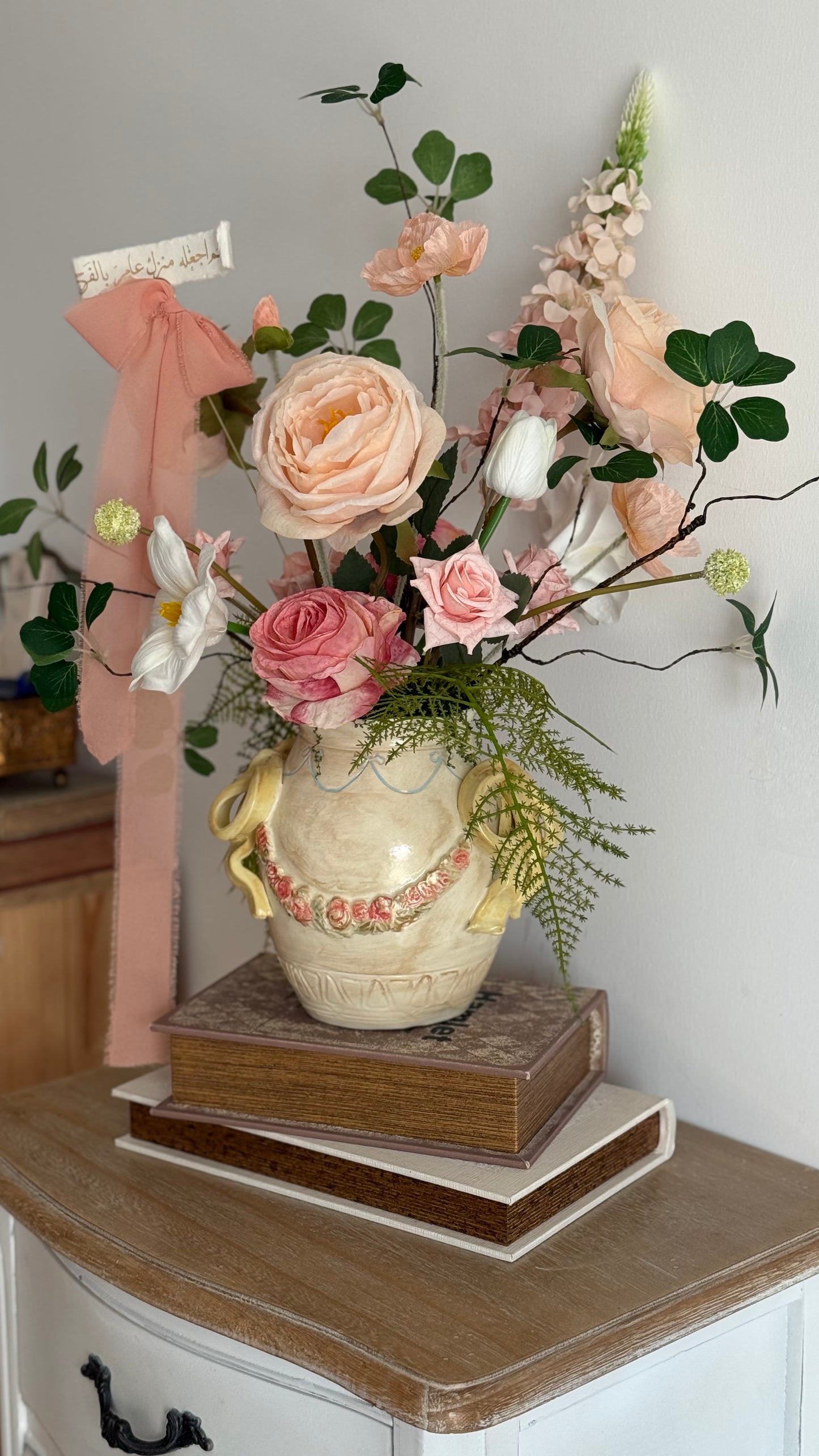 Ceramic bow details flower arrangement