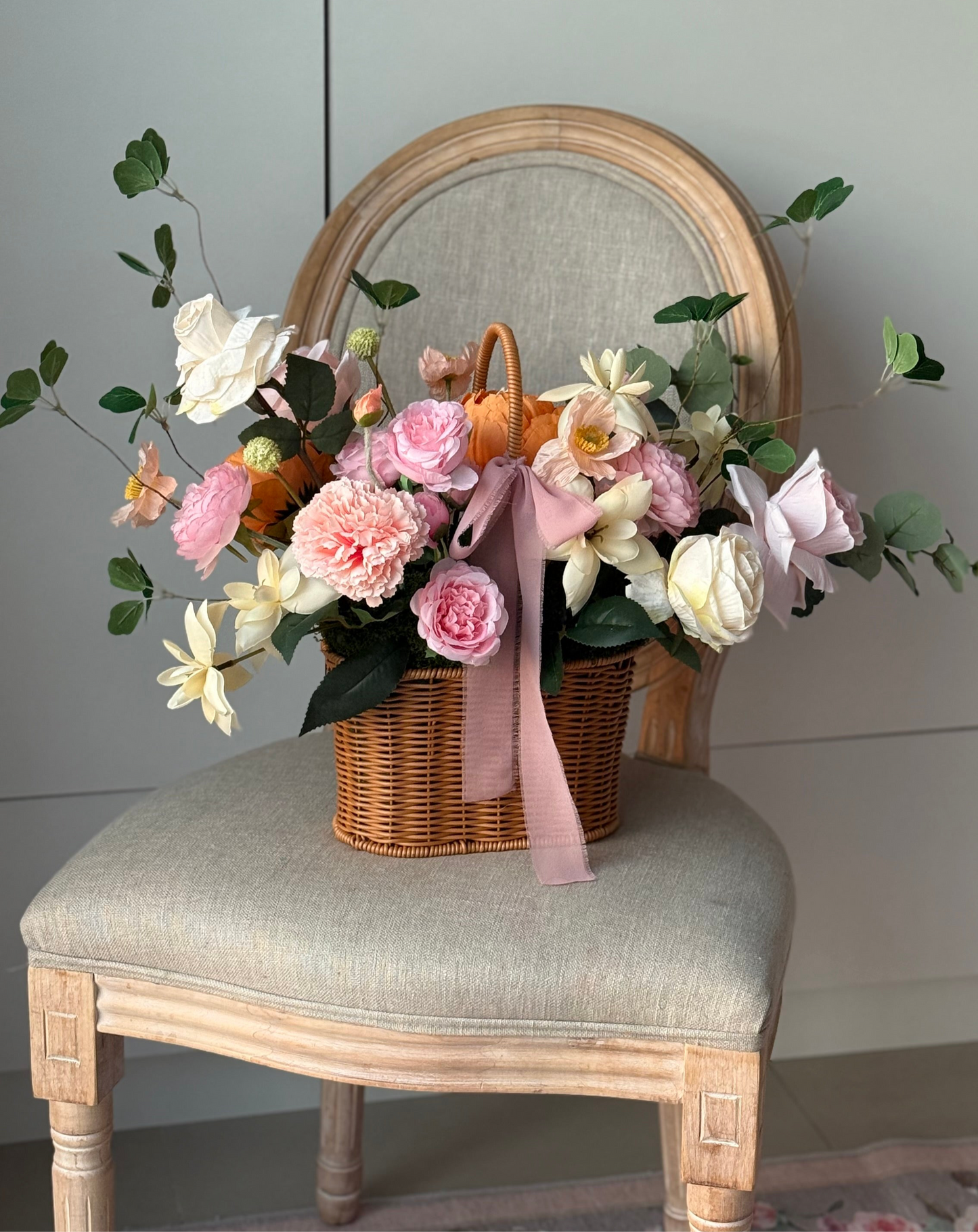 Large basket with handle flower arrangement