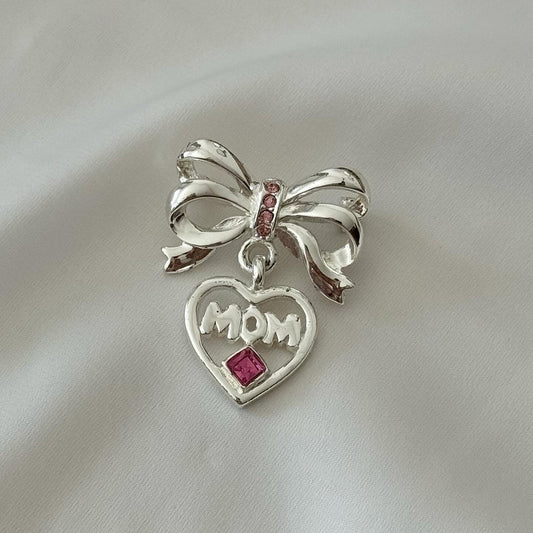 Vintage silver bow with pink crystals and heart with (Mom) word