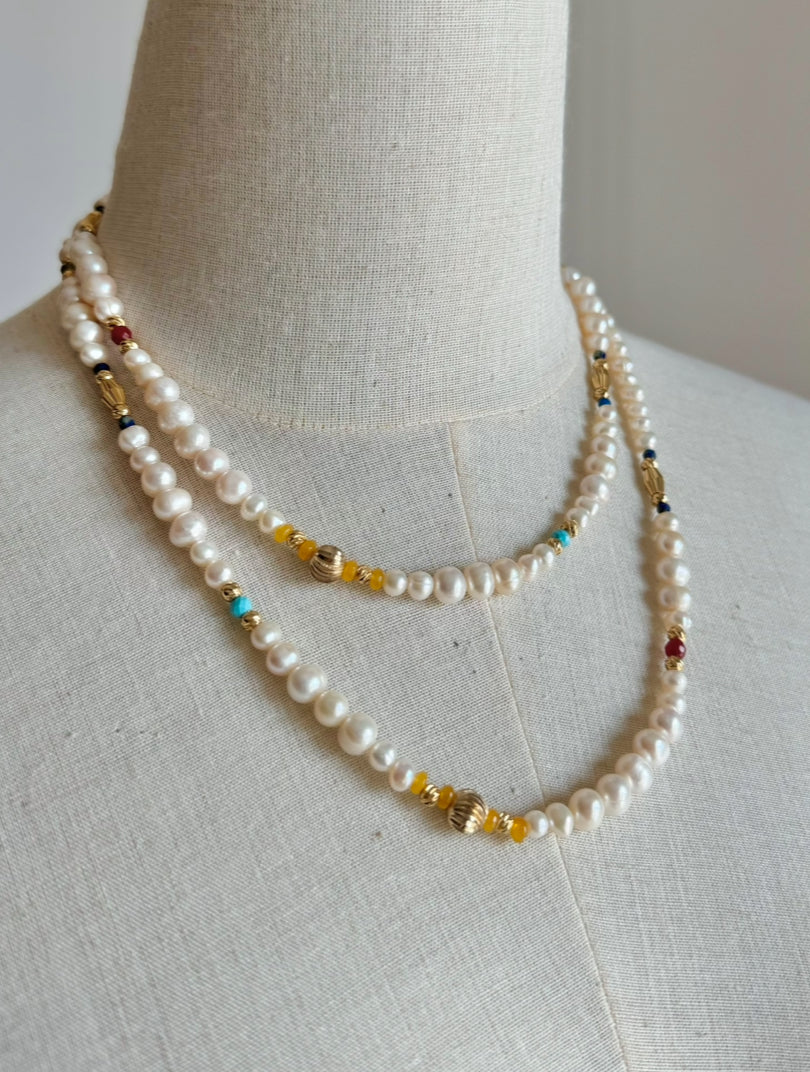 Extra long pearl necklace with colorful stones