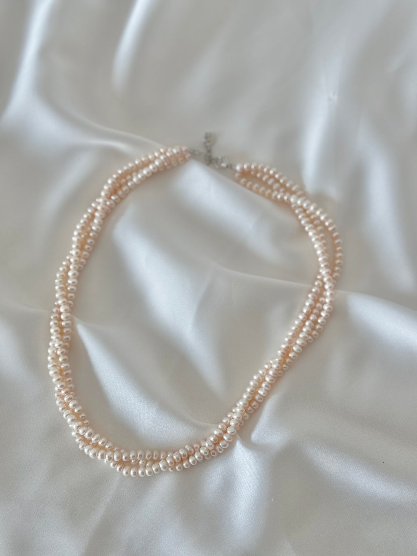 Three layer twisted pearl necklace