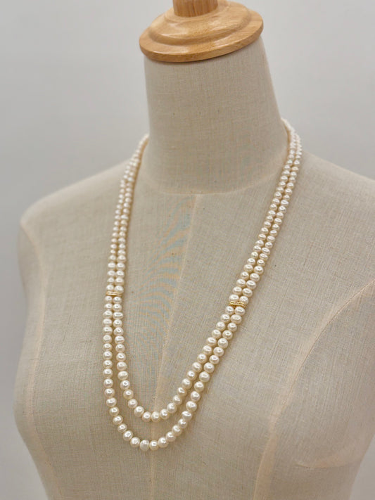 Double line pearl necklace with crystal connecters