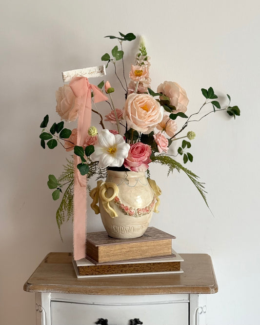 Ceramic bow details flower arrangement