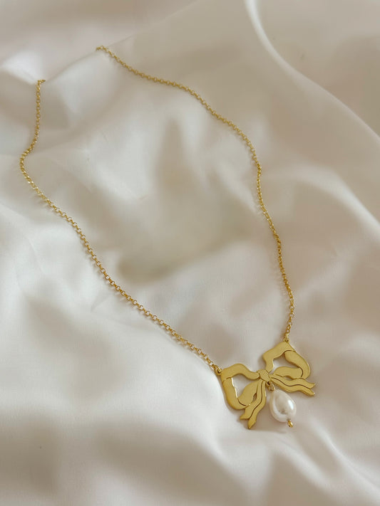 Gold plated silver bow with pearls drop necklace