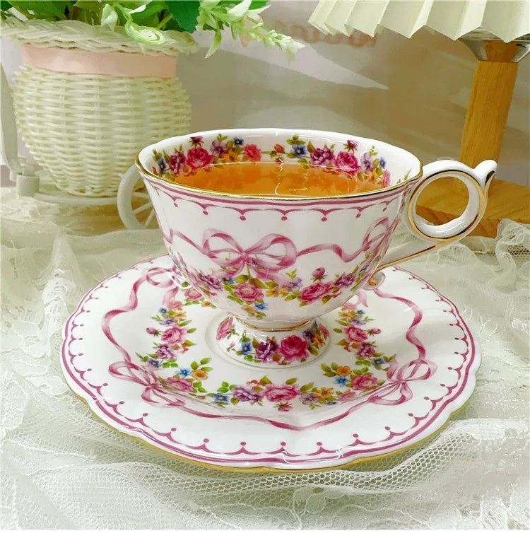 Vintage style bow style Teapot and Teacup Saucer