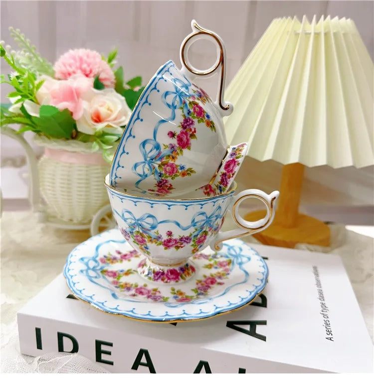 Vintage style bow style Teapot and Teacup Saucer