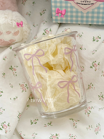 Glass cup with bow designs