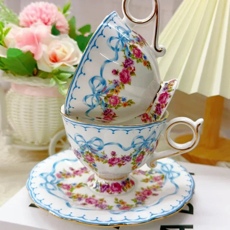 Vintage style bow style Teapot and Teacup Saucer