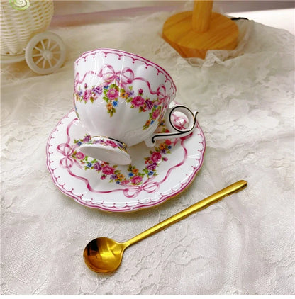 Vintage style bow style Teapot and Teacup Saucer