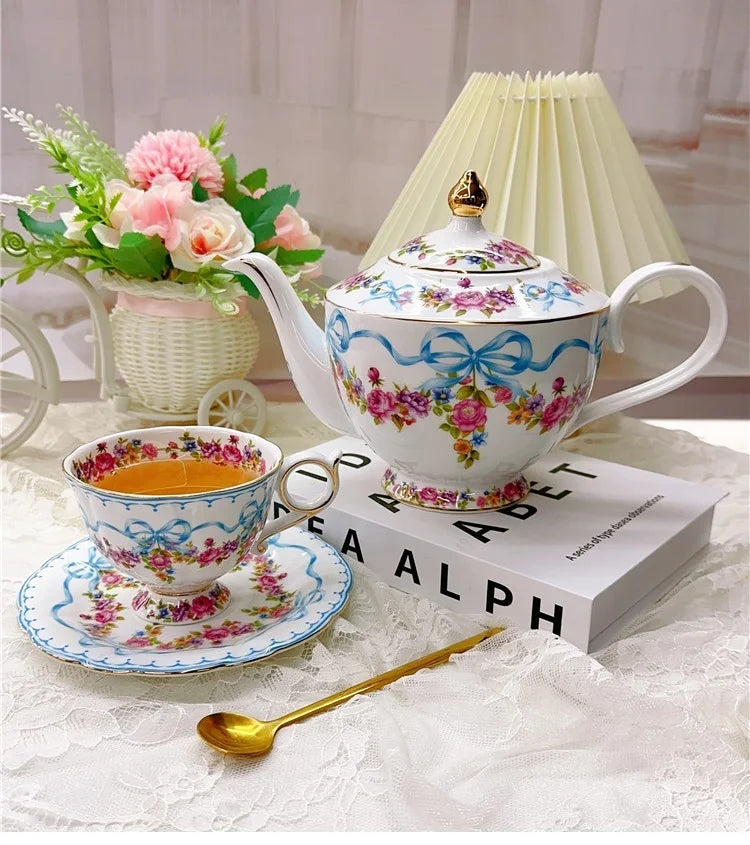 Vintage style bow style Teapot and Teacup Saucer