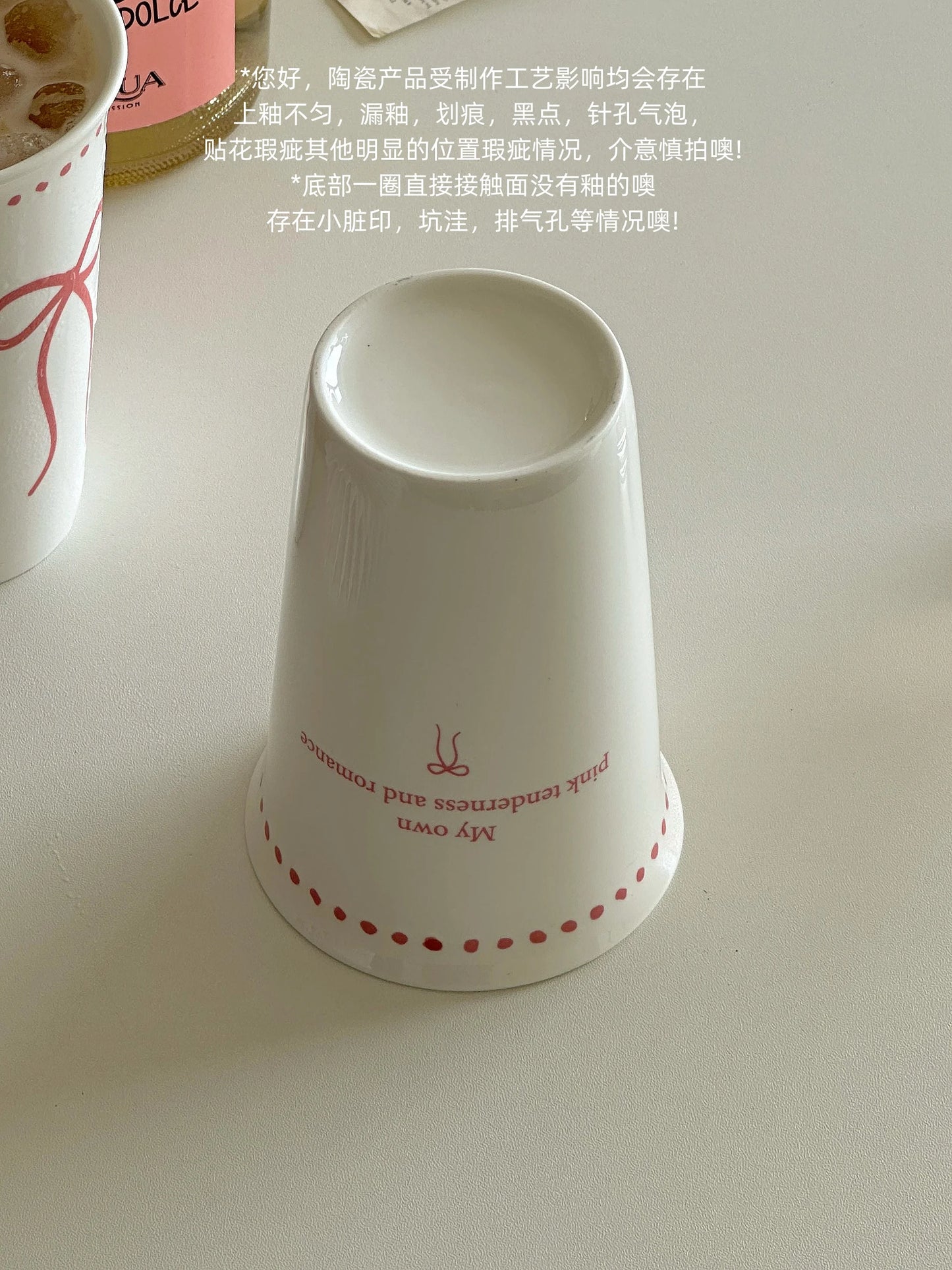 Long white ceramic glass with bow design