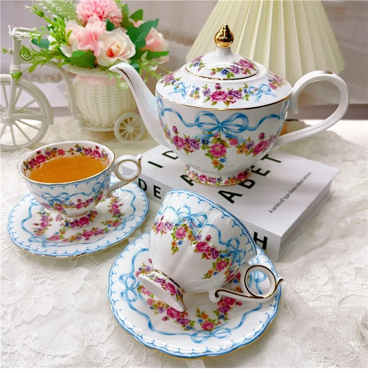 Vintage style bow style Teapot and Teacup Saucer