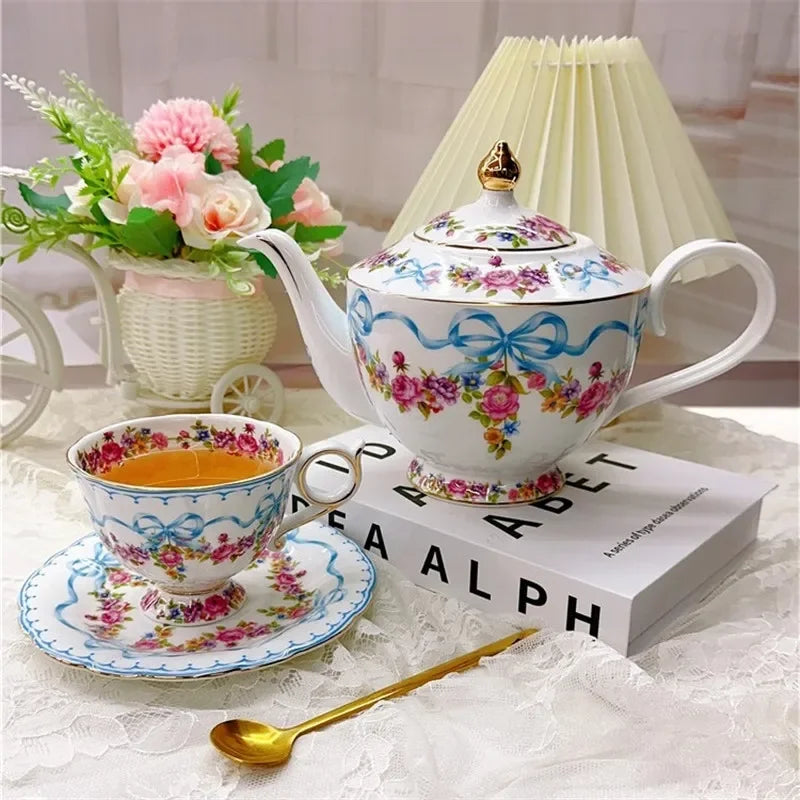 Vintage style bow style Teapot and Teacup Saucer