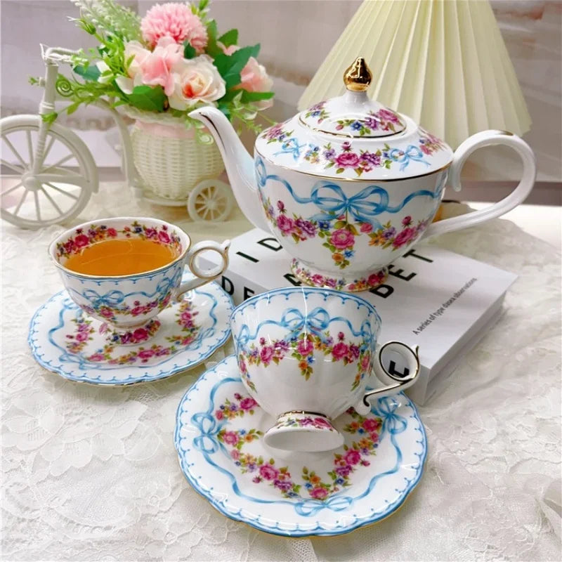 Vintage style bow style Teapot and Teacup Saucer