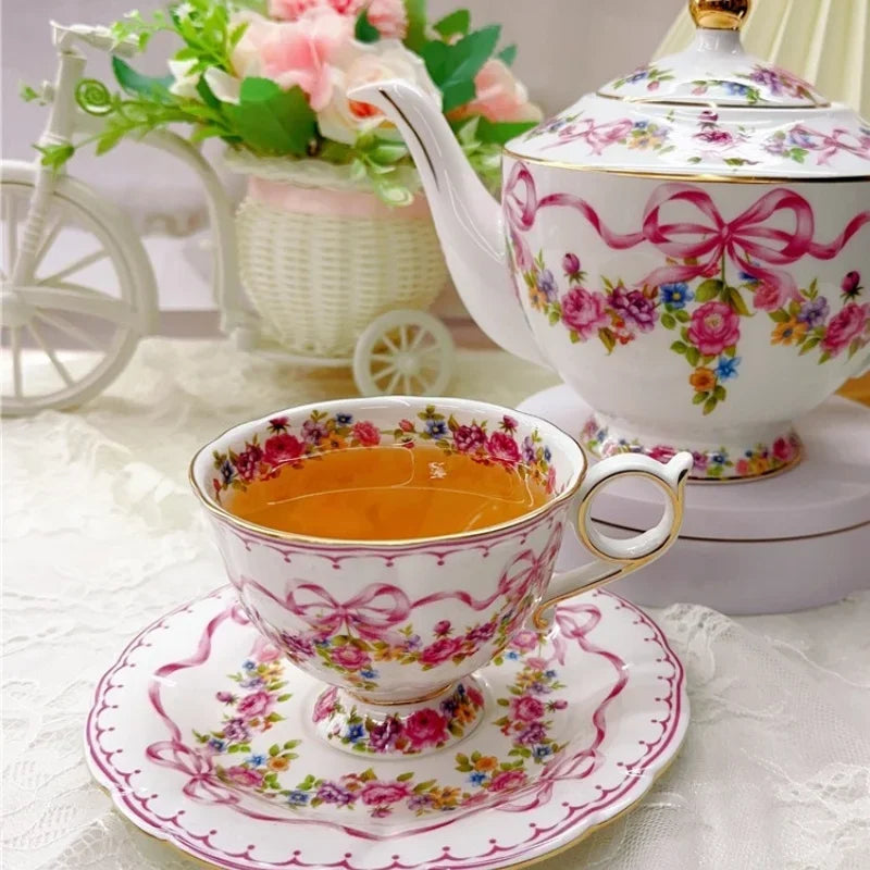 Vintage style bow style Teapot and Teacup Saucer