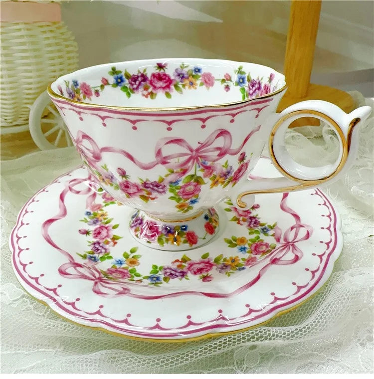 Vintage style bow style Teapot and Teacup Saucer