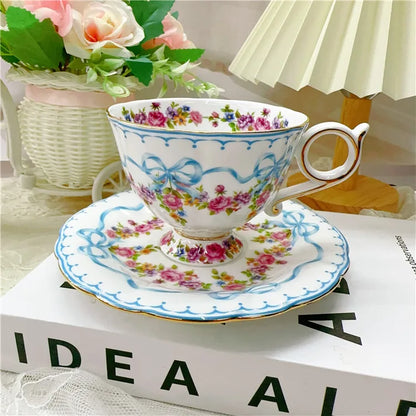 Vintage style bow style Teapot and Teacup Saucer