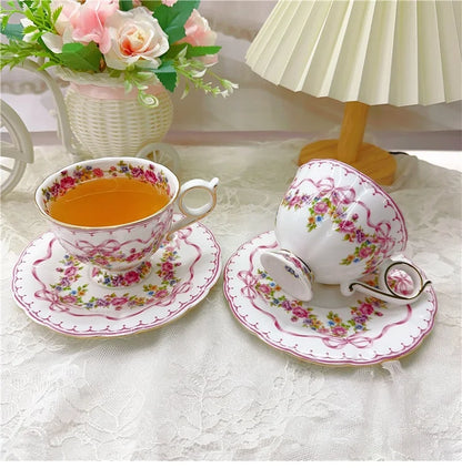 Vintage style bow style Teapot and Teacup Saucer