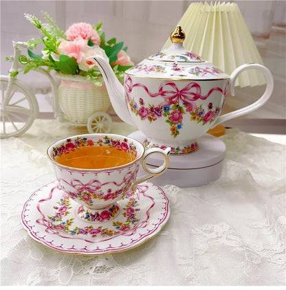 Vintage style bow style Teapot and Teacup Saucer