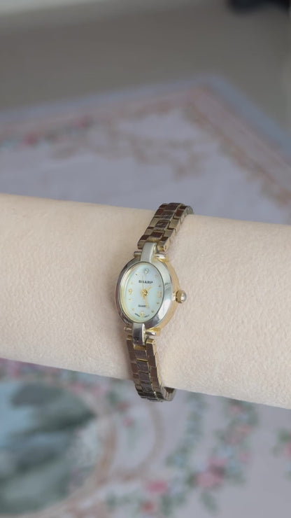 Mini Vintage working watch, very good condition, washed out gold plated band